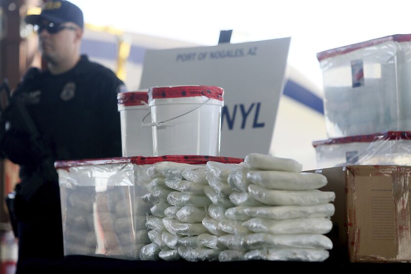 FILE - A display of the fentanyl and meth that was seized by U.S. Customs and Border Protection officers at the Nogales Port of Entry is shown during a press conference, Jan. 31, 2019, in Nogales, Ariz. On Tuesday, Feb. 7, President Joe Biden faced harsh rebukes from multiple angles as he spoke during his State of the Union address about trying to contain a drug overdose crisis driven by powerful illicit synthetic opioids like fentanyl, that has been killing more than 100,000 people a year in the U.S. (Mamta Popat/Arizona Daily Star via AP, File)
