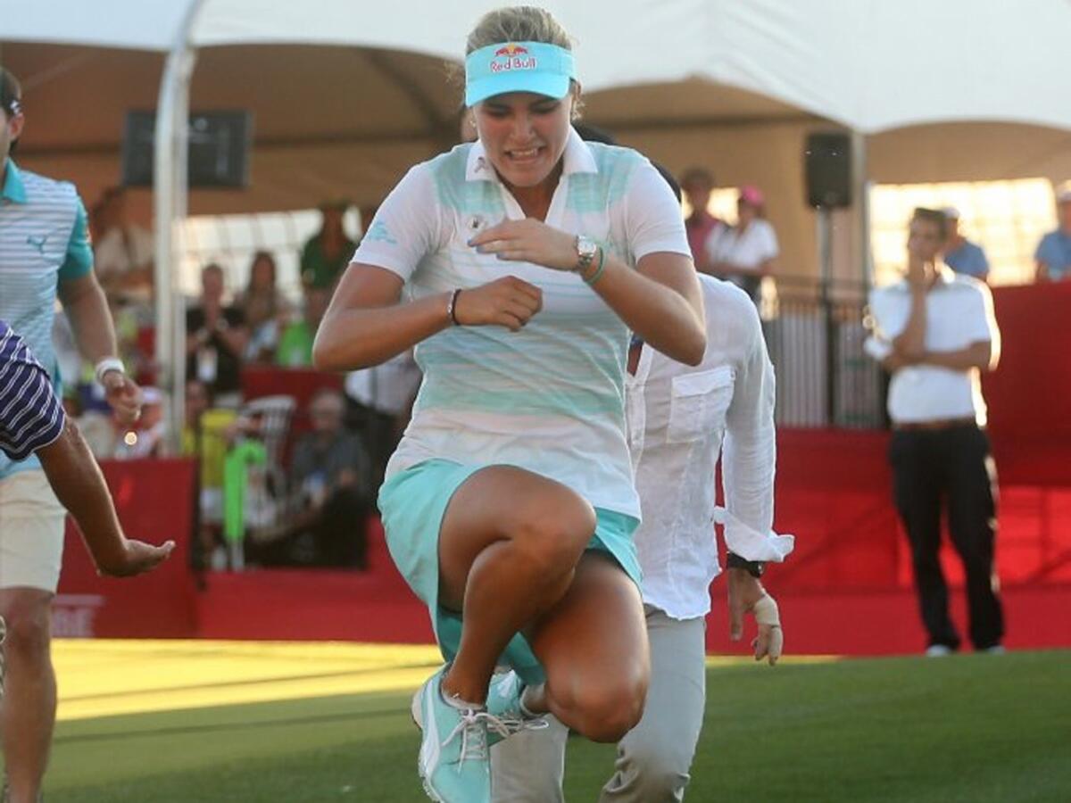 Lexi Thompson takes the traditional leap into Poppie's Pond after winning last year's tournament at Mission Hills Country Club in Rancho Mirage, Calif. She'll look to become only the second player to repeat as champion.