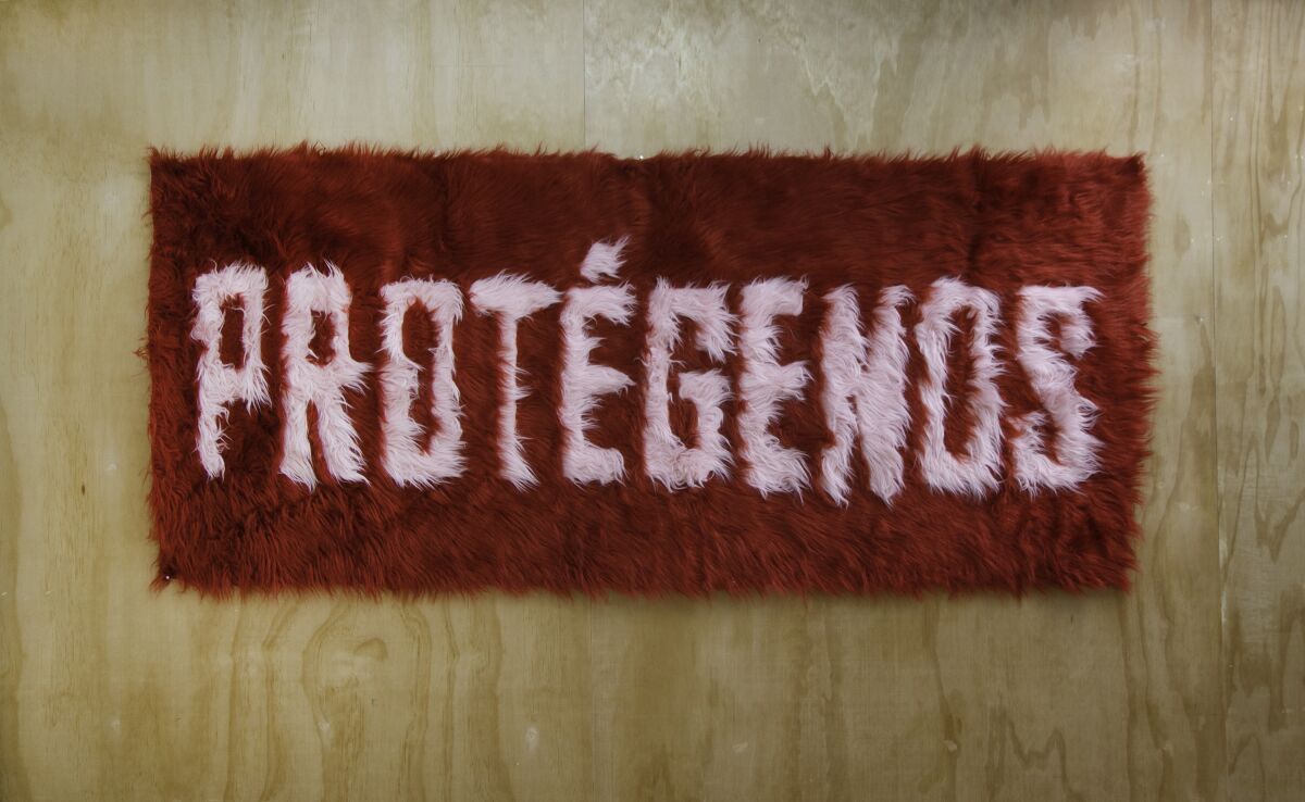 Areli Arellano's fuzzy installation, "Una Oración de Las Voces Marginadas," at Ochi Projects