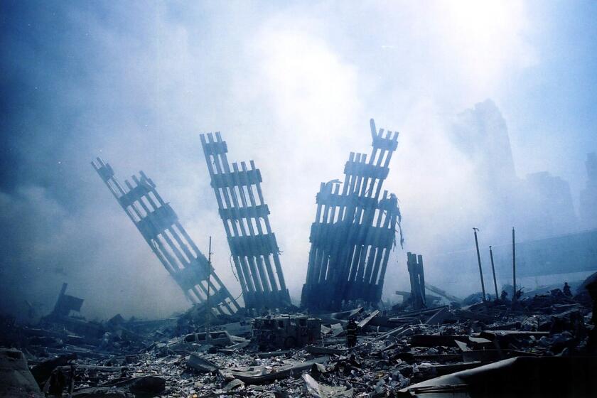 The rubble of the World Trade Center smoulders following a terrorist attack September 11, 2001 in New York. A hijacked plane crashed into and destroyed the landmark structure. AFP PHOTO/Alexandre Fuchs (Photo by ALEXANDRE FUCHS / AFP) (Photo by ALEXANDRE FUCHS/AFP via Getty Images)