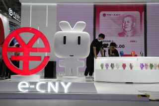 Un kiosco para promover la versión digital del yuan chino en Beijing, el 2 de septiembre del 2022. (Foto AP/Ng Han Guan)