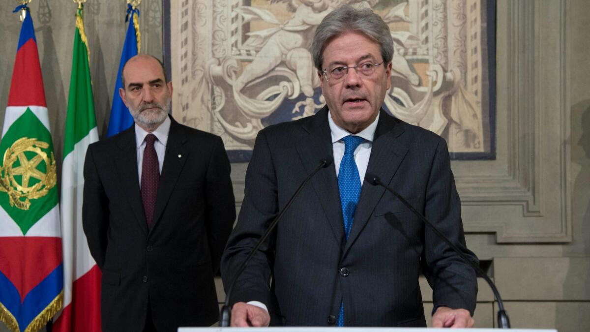 Paolo Gentiloni speaks at the Quirinale presidential palace in Rome on Dec. 11.