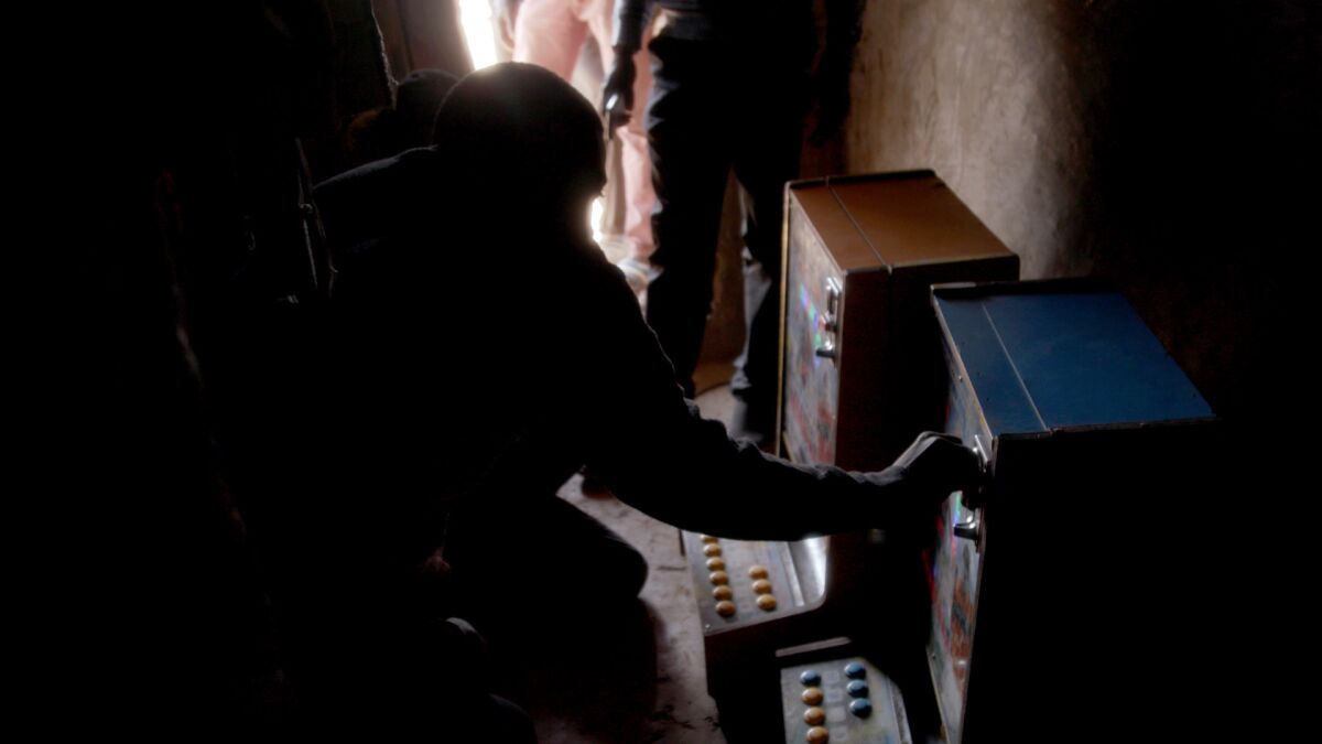 Half of the population in Ghana's Northern Region lives below the poverty line, yet the slot machines are almost everywhere. (Noah Fowler / For The Times)