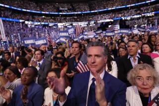 CHICAGO, IL AUGUST 22, 2024 - Gov. Gavin Newsom applauds during the Democratic National Convention Thursday, Aug. 22, 2024, in Chicago, IL. (Robert Gauthier/Los Angeles Times)