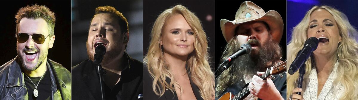 This combination of photos shows nominees for the CMA Award for entertainer of the year, from left, Eric Church, Luke Combs, Miranda Lambert, Chris Stapleton and Carrie Underwood. (AP Photo)