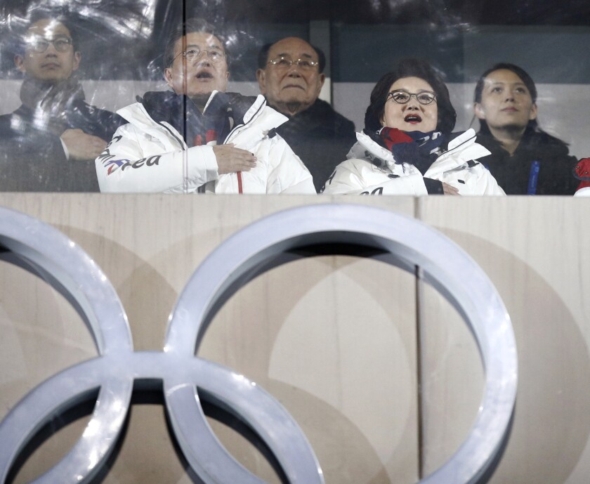 FILE - In this Feb. 9, 2018, file photo, Kim Yo Jong, right, North Korean leader Kim Jong Un's sister, and Kim Yong Nam, president of the Presidium of the Presidium of the Supreme People's Assembly of North Korea, center, observe with South Korean President Moon Jae-in, second from left, and first lady Kim Jung-sook during the opening ceremony of the 2018 Winter Olympics in Pyeongchang, South Korea, Friday, Feb. 9, 2018. North Korea has decided not to participate in this year’s Olympic Games in Tokyo as it continues a self-imposed lockdown amid the coronavirus pandemic. A website run by the North's Sports Ministry said the decision was made during a national Olympic Committee meeting on March 25, 2021 where members prioritized protecting athletes from the “world public health crisis caused by COVID-19.” (AP Photo/Jae C. Hong, File)