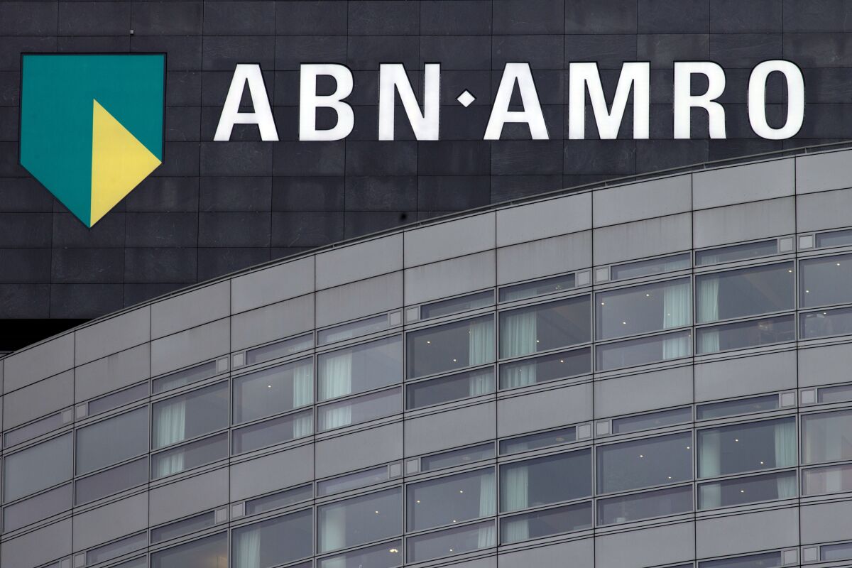 FILE - The logo of the state-owned ABN-AMRO bank sits on its head office in Amsterdam, Netherlands, Jan. 9, 2014. Dutch bank ABN AMRO apologized Wednesday, April 13, 2022 for historic links to the slave trade in the 18th and 19th centuries including the involvement of one of the bank's predecessor institutions in “day-to-day business” of plantations. (AP Photo/Peter Dejong, file)