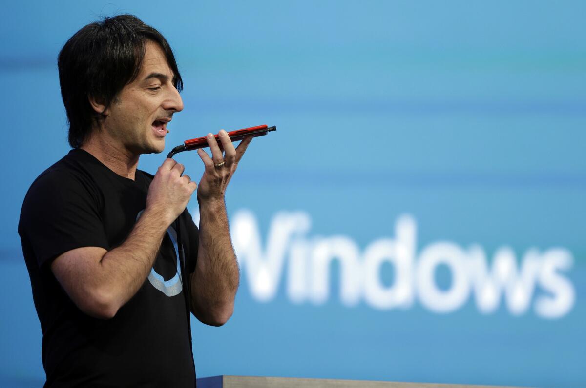 Microsoft corporate Vice President Joe Belfiore of the operating systems group demonstrates the new Cortana personal assistant during the keynote address of the Build Conference on Wednesday.