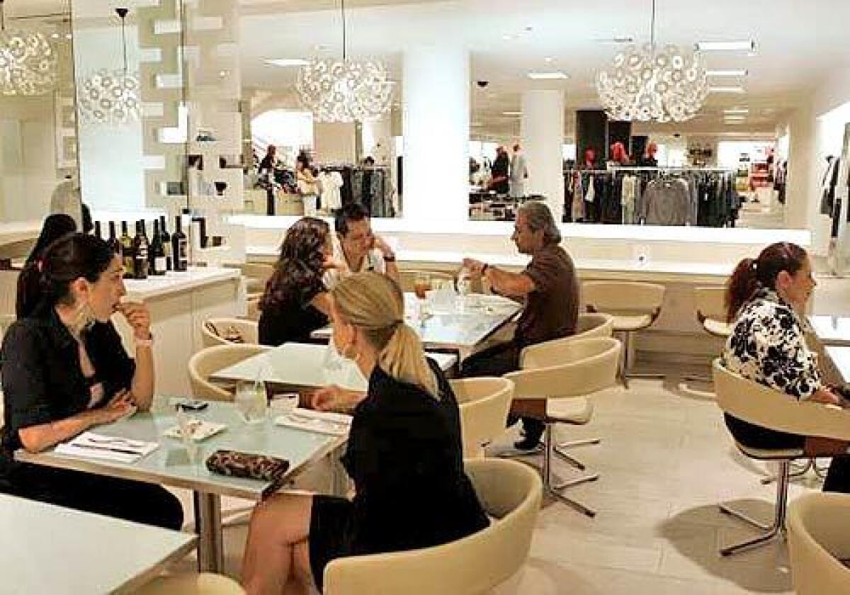 At Saks Fifth Avenue in Beverly Hills, food and fashion have dropped their hostilities. SnAKS Cafe, the retailer's new in-store restaurant and bar, opened in June, marking a revival of a grand old tradition, but with a twist. Say goodbye to the tearoom, hello to the cocktail lounge. OK, they're just wine-based drinks, but the trend is unmistakable and too delicious to pass up.