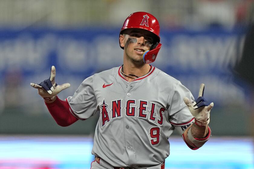 Los Angeles Angels' Zach Neto runs the bases after hitting a solo home run during the sixth inning of a baseball game against the Kansas City Royals Tuesday, Aug. 20, 2024, in Kansas City, Mo. (AP Photo/Charlie Riedel)