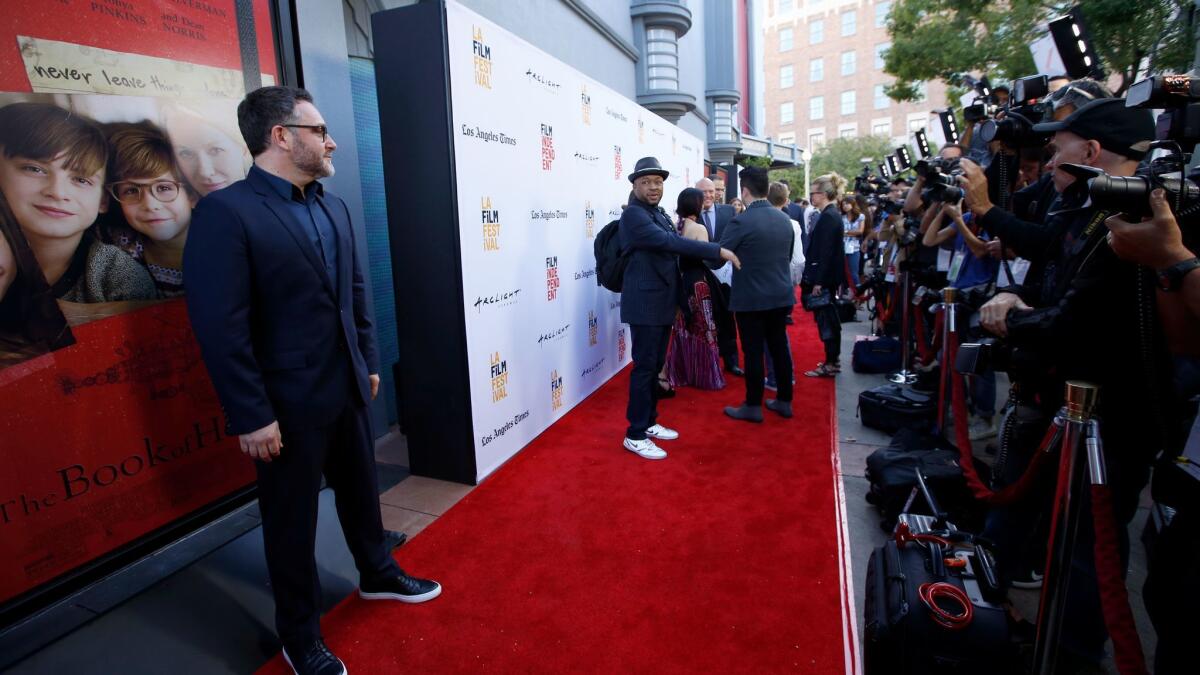 "The Book of Henry" director Colin Trevorrow, left, on the red carpet at the opening of the L.A. Film Festival at the ArcLight in Culver City on June 14.