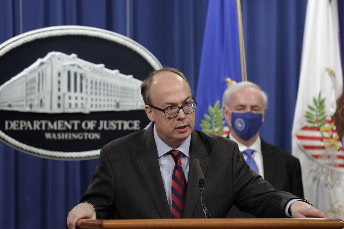 FILE - Acting Assistant U.S. Attorney General Jeffrey Clark speaks as he stands next to Deputy Attorney General Jeffrey A. Rosen during a news conference at the Justice Department in Washington, Oct. 21, 2020. Clark, who aligned himself with former President Donald Trump after he lost the 2020 election has declined to be fully interviewed by a House committee investigating the Jan. 6 Capitol insurrection, ending a deposition after around 90 minutes on Friday, Nov. 5. (Yuri Gripas/Pool via AP, File)