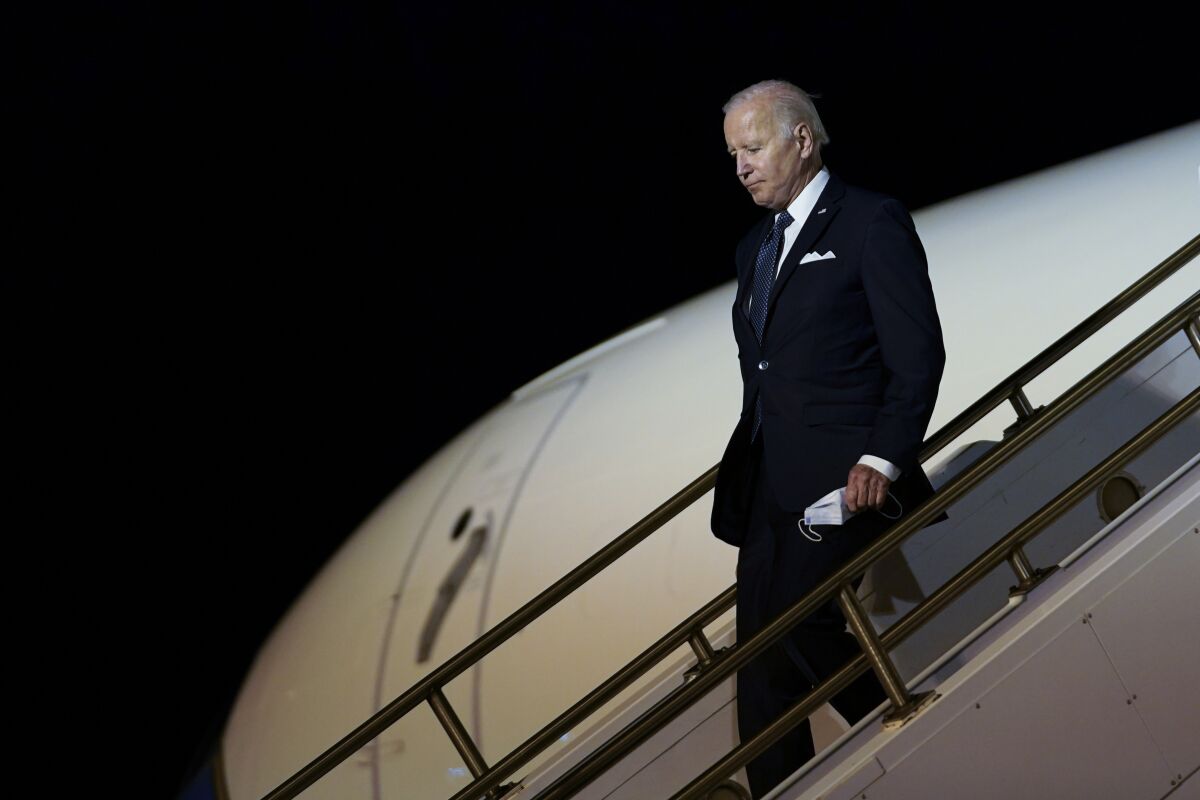 President Joe Biden walks down the steps of Air Force One at Dover Air Force Base, Del., Thursday, June 2, 2022