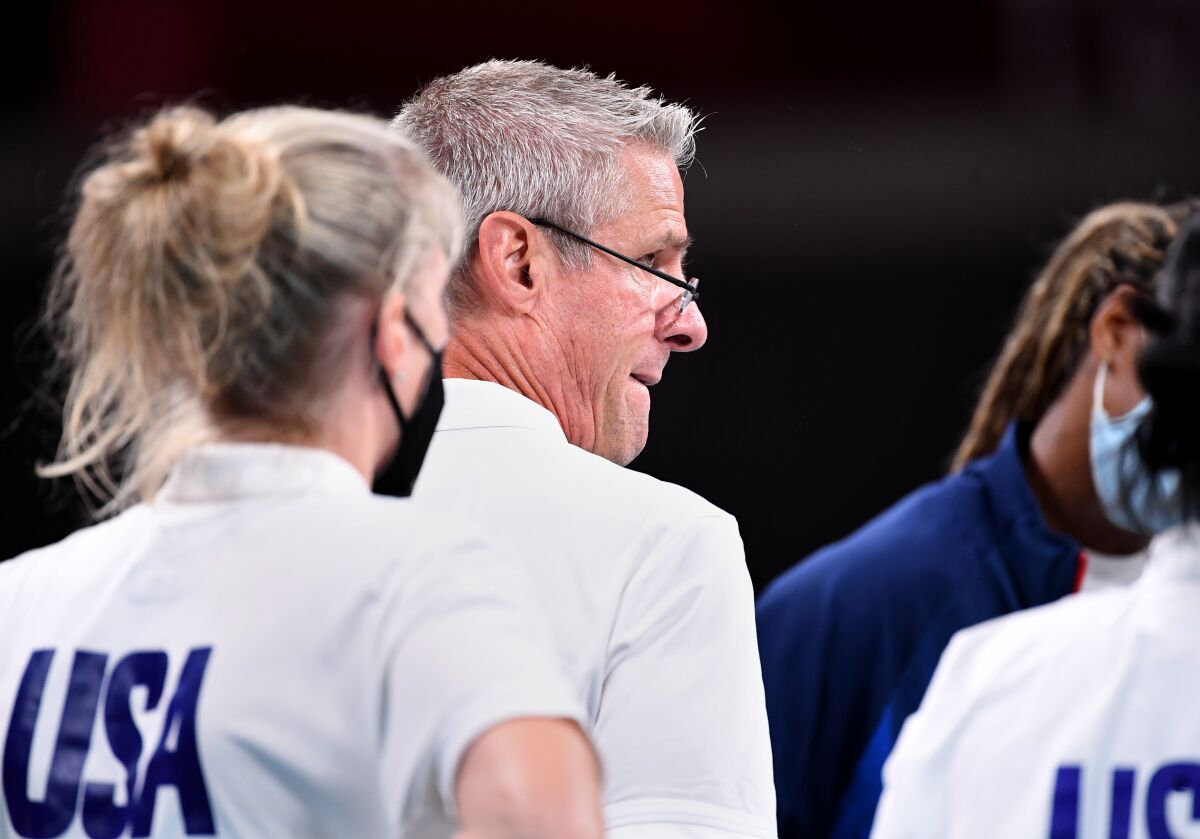 U.S. volleyball coach Karch Kiraly talks to his team 