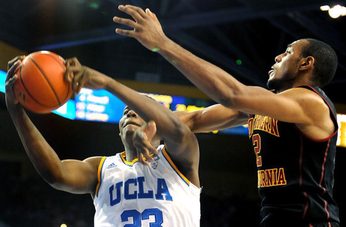UCLA center Tony Parker is fouled by USC forward Roschon Prince while battling for a rebound during a Pac-12 Conference game this month.