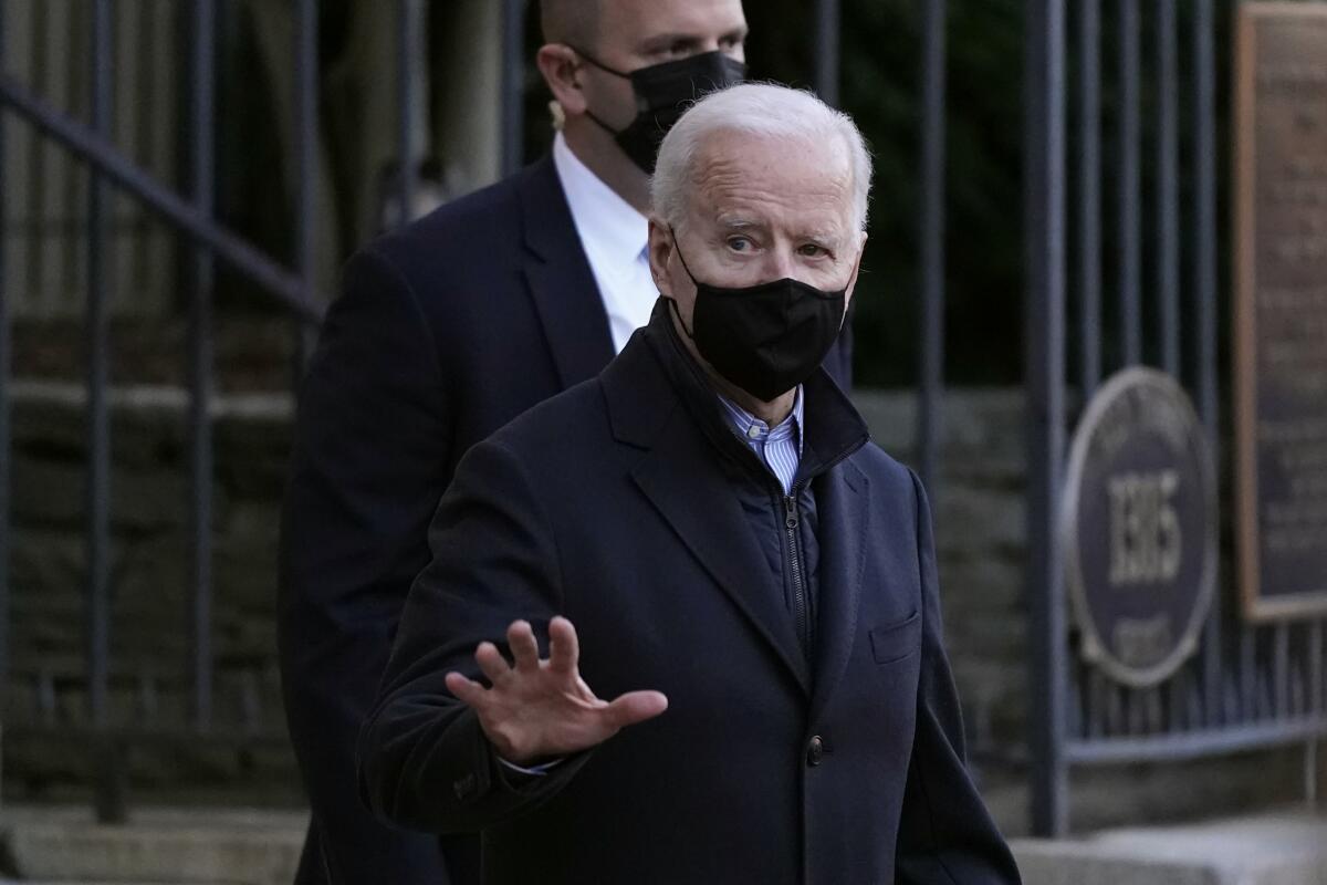 President Biden leaves Holy Trinity Catholic Church in Washington.