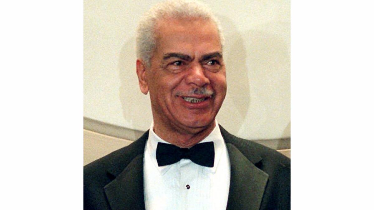Veteran actor Earle Hyman, posing at the Gershwin Theatre in New York in 1997, portrayed paternal grandfather Russell Huxtable on "The Cosby Show."