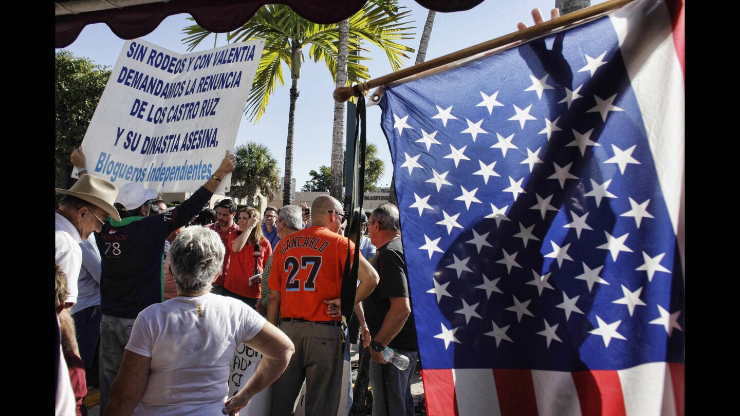 Anti-Castro activists protest in Little Havana in Miami, Florida December 17, 2014. News on Wednesday that the United States will restore full diplomatic relations with Cuba and open an embassy in Havana for the first time in more than a half century rippled through the 1.5-million-strong exile community in the United States, many of them lifelong opponents of communist rule.