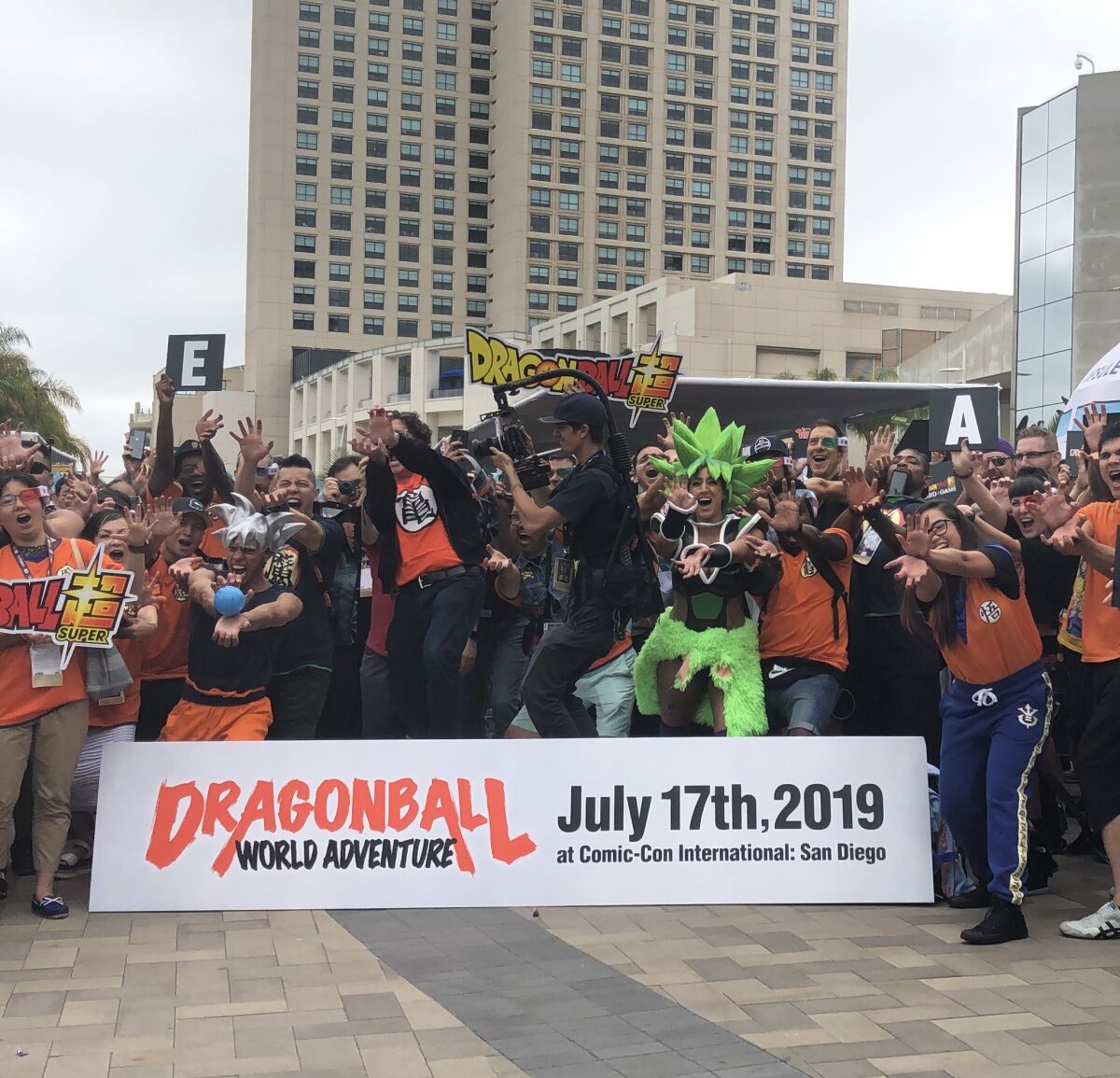 "Dragonball" enthusiasts practice performing the "kamehameha" movement in unison to break a Guinness World Record on Comic-Con Preview Day.