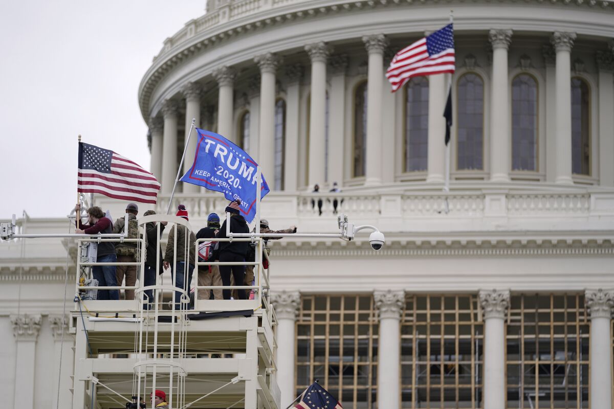 Trump supporters rally in Washington before violently storming the U.S. Capitol on Jan. 6. 