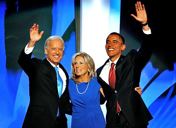 Sen. Barack Obama of Illinois, right, makes a surprise appearance onstage at the Democratic National Convention after Sen. Joe Biden of Delaware, seen with his wife, Jill, gives his acceptance speech as the Democratic Party's nominee for vice president. Earlier in the day, Obama officially became the first black presidential nominee of a major party.
