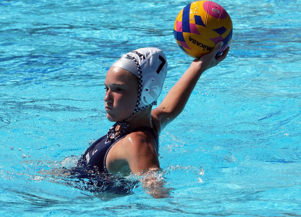 Newport Beach 14U player Mallory Collins (7) scores a goal against Irvine Patriot in Sunday's gold medal match.