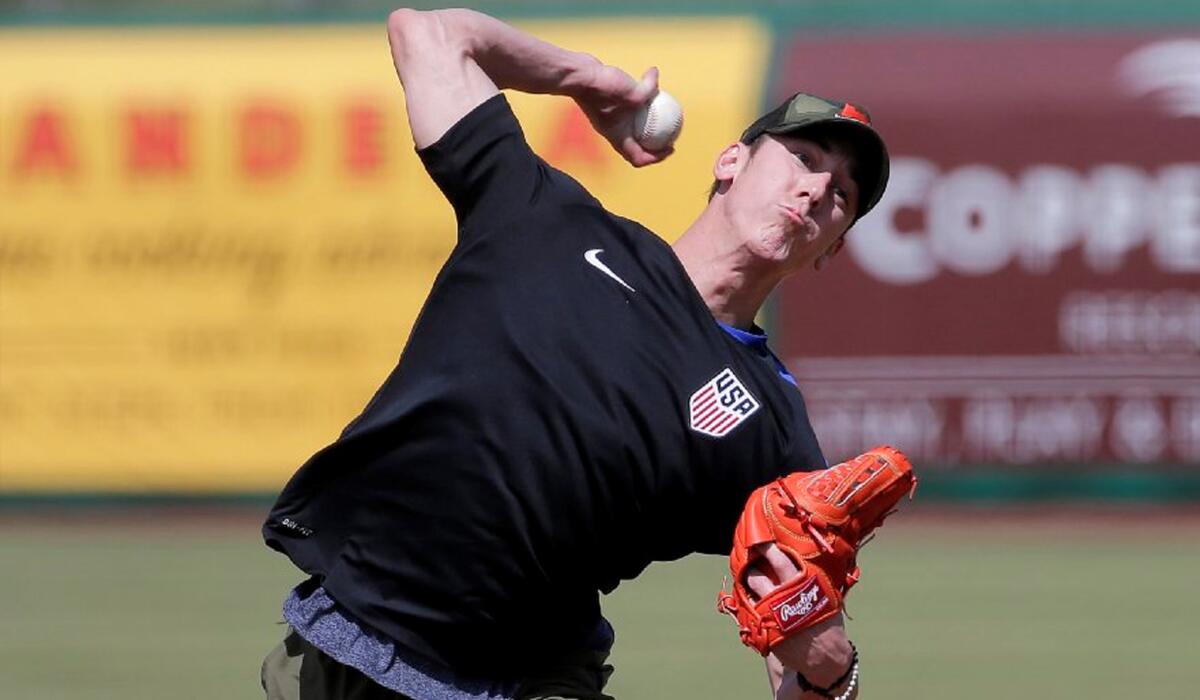 Former Cy Young Award winner Tim Lincecum throws for MLB baseball scouts on May 6 in Scottsdale, Ariz.
