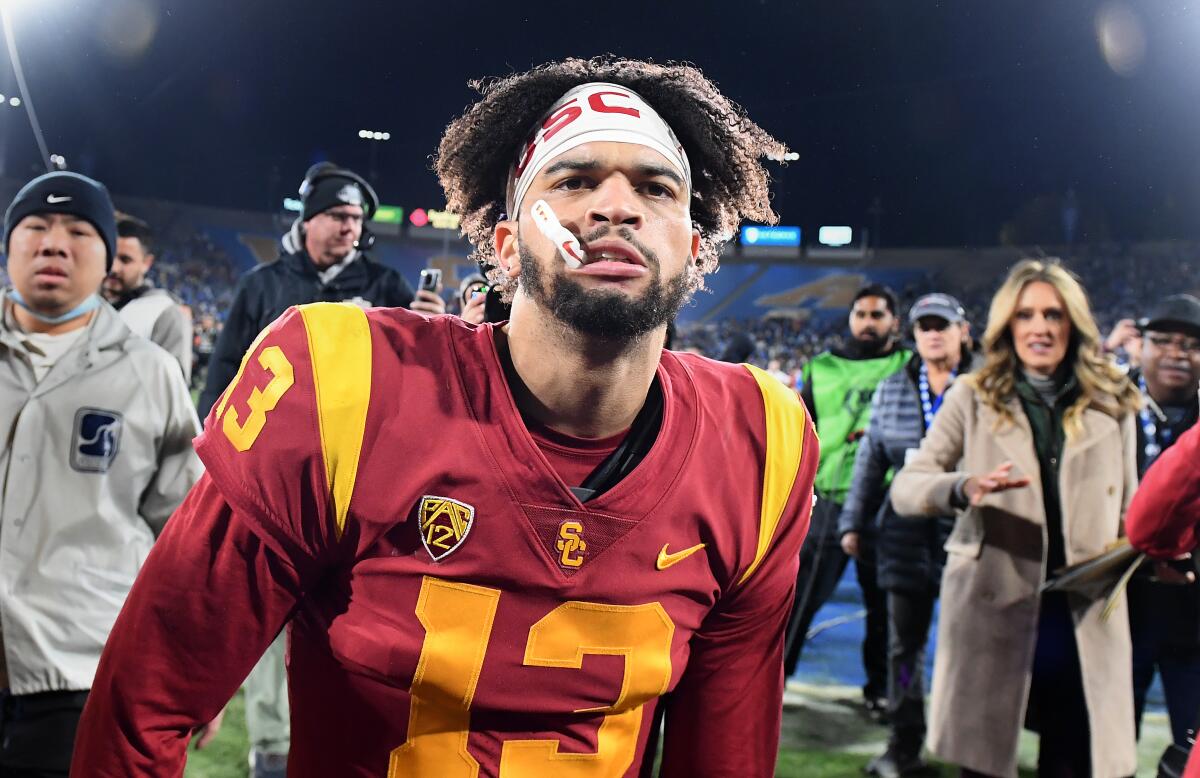 USC quarterback Caleb Williams celebrates after the Trojans' win over UCLA at the Rose Bowl on Nov. 19. 