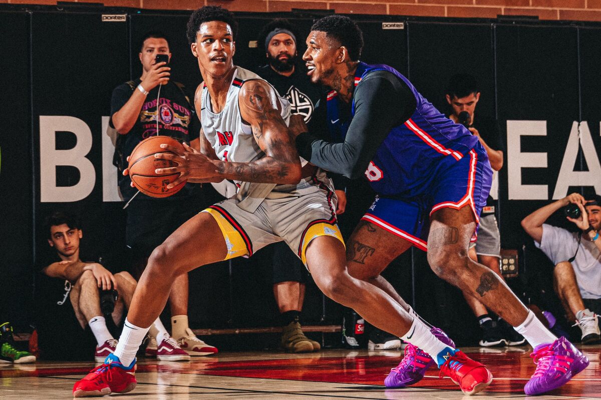 Shareef O'Neal posts up Nick "Swaggy P" Young during a Drew League game in July 2019.