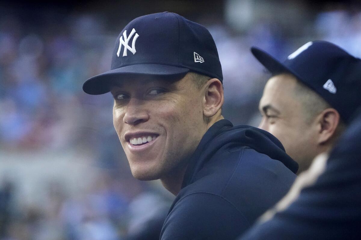 New York Yankees' Aaron Judge sits in the dugout during a baseball game against the Texas Rangers in Arlington, Texas, Wednesday, Oct. 5, 2022. (AP Photo/LM Otero)