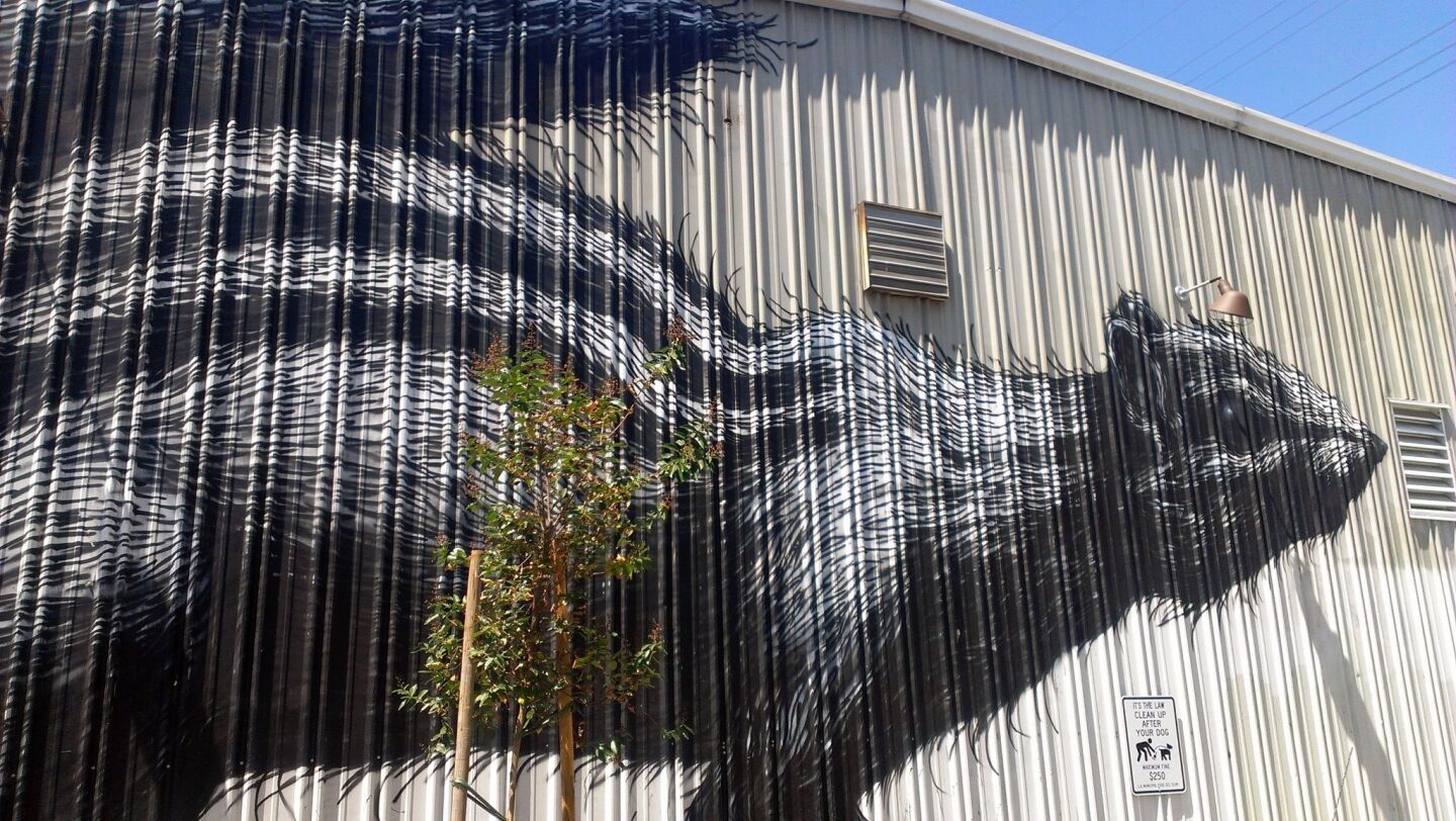 A chipmunk mural on the side of Urban Radish's building was created by Belgian artist Peter Roa.