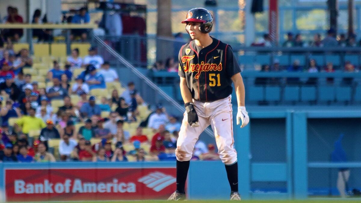 USC catcher Garrett Stubbs leads off second base after swiping a bag against UCLA in the Dodger Stadium College Baseball Classic.