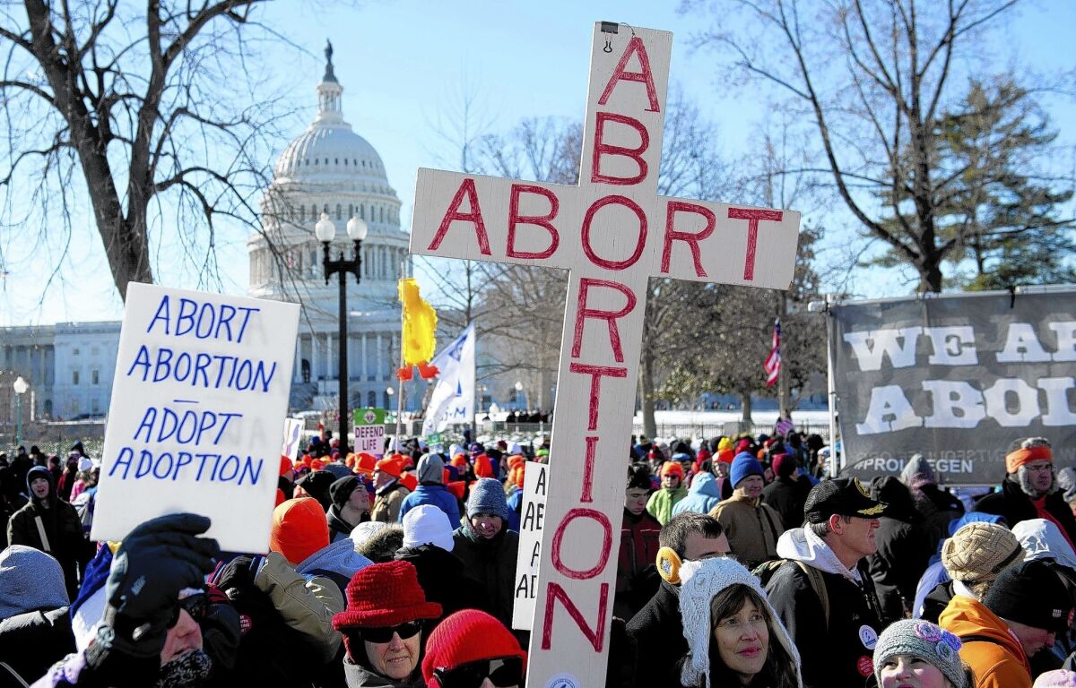 Antiabortion demonstrators protest in Washington. A case involving no-protest zones at abortion clinics is among the 1st Amendment issues brought by right-wing groups to the Supreme Court in its coming term.