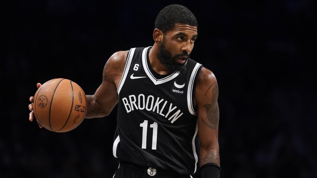 Brooklyn Nets guard Kyrie Irving controls the ball during a game against the Dallas Mavericks on Oct. 27.
