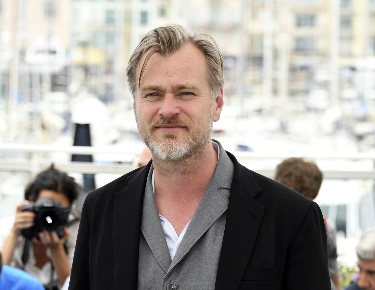 FILE - Director Christopher Nolan poses during a photo call at the 71st international film festival, Cannes, southern France on May 12, 2018. After a public fallout over release strategy with Warner Bros., Nolan’s next film, about J. Robert Oppenheimer and the development of the atom bomb, will be released by Universal Pictures. (Photo by Arthur Mola/Invision/AP, File)