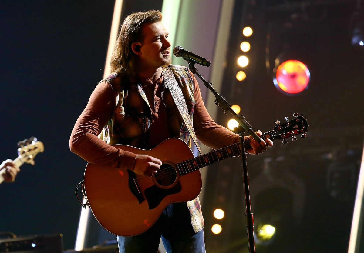 Morgan Wallen performs at “The 54th Annual CMA Awards” broadcast on Wednesday, November 11, 2020 in Nashville.