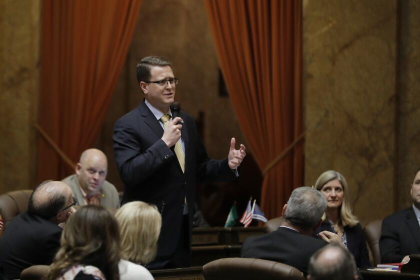 Rep. Matt Shea, R-Spokane, speaks Tuesday, April 9, 2019, on the House floor at the Capitol in Olympia, Wash., as lawmakers continued to work through the final month of the regular session of the Legislature. (AP Photo/Ted S. Warren)