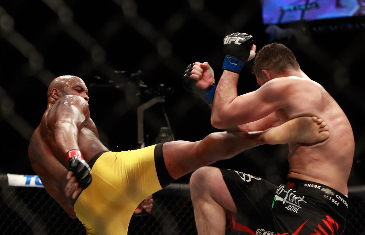 Anderson Silva lands a kick against Nick Diaz during their middleweight fight at UFC 183 on Saturday night in Las Vegas.