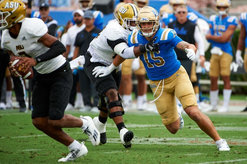 UCLA linebacker Laiatu Latu looks for a sack against Alabama State on Sept. 10 at the Rose Bowl.