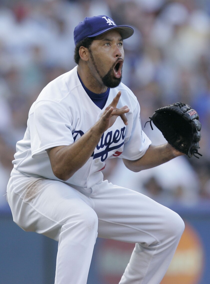 Dodgers starting pitcher Jose Lima reacts afte 