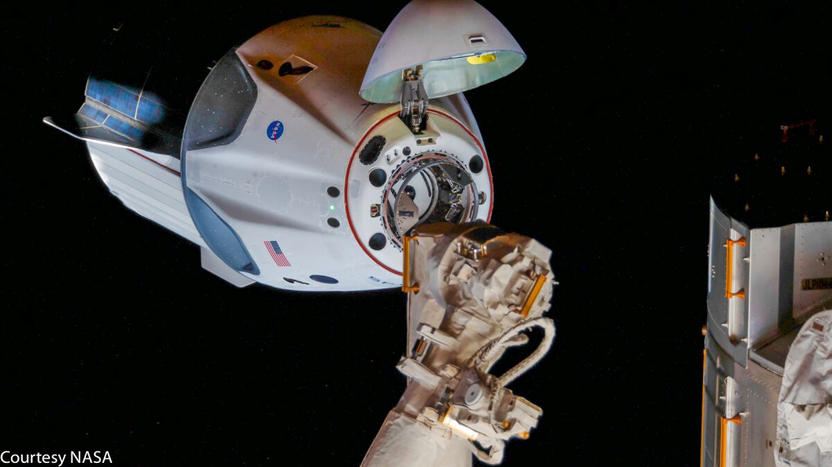Doug Hurley and Bob Behnken aboard Crew Dragon docking with ISS (May 31, 2020)
