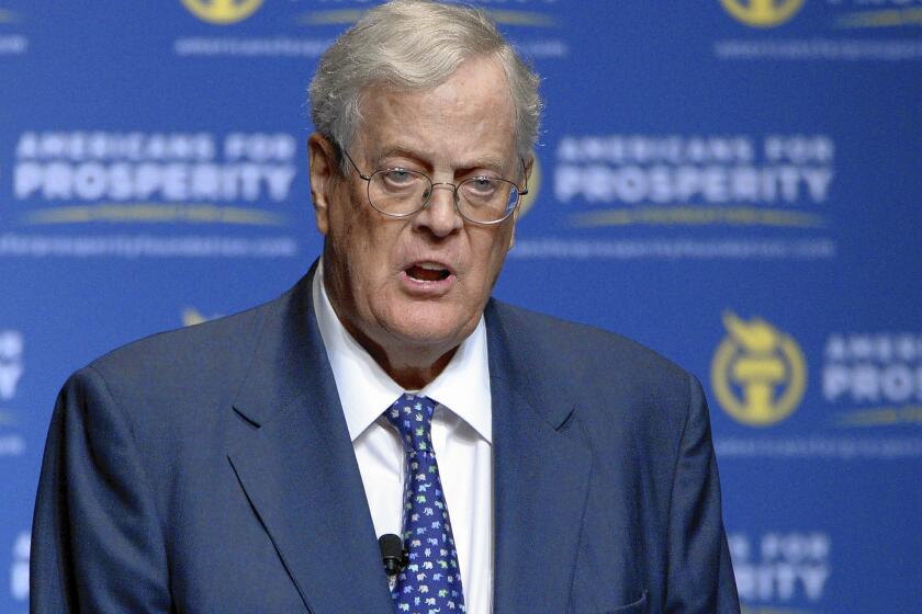 David Koch speaks in Orlando, Fla. In the 2012 election, David and Charles Koch raised more than $400 million to oppose President Obama and other Democrats.