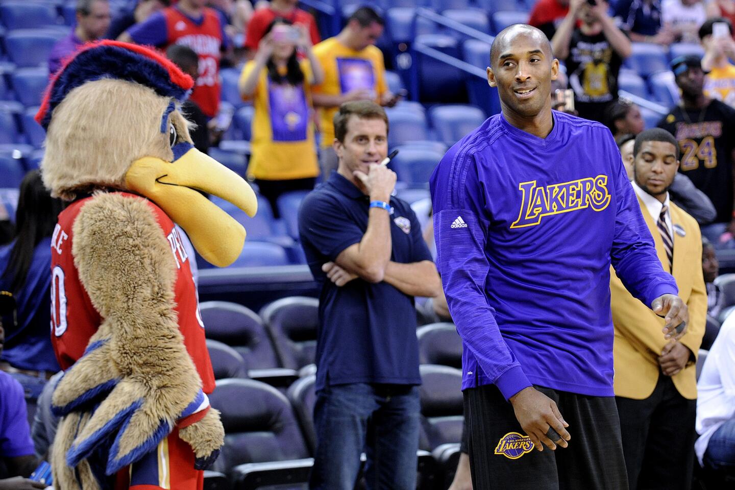 The New Orleans mascot pays a visit toKobe Bryant as he warms up for the game against the Pelicans.