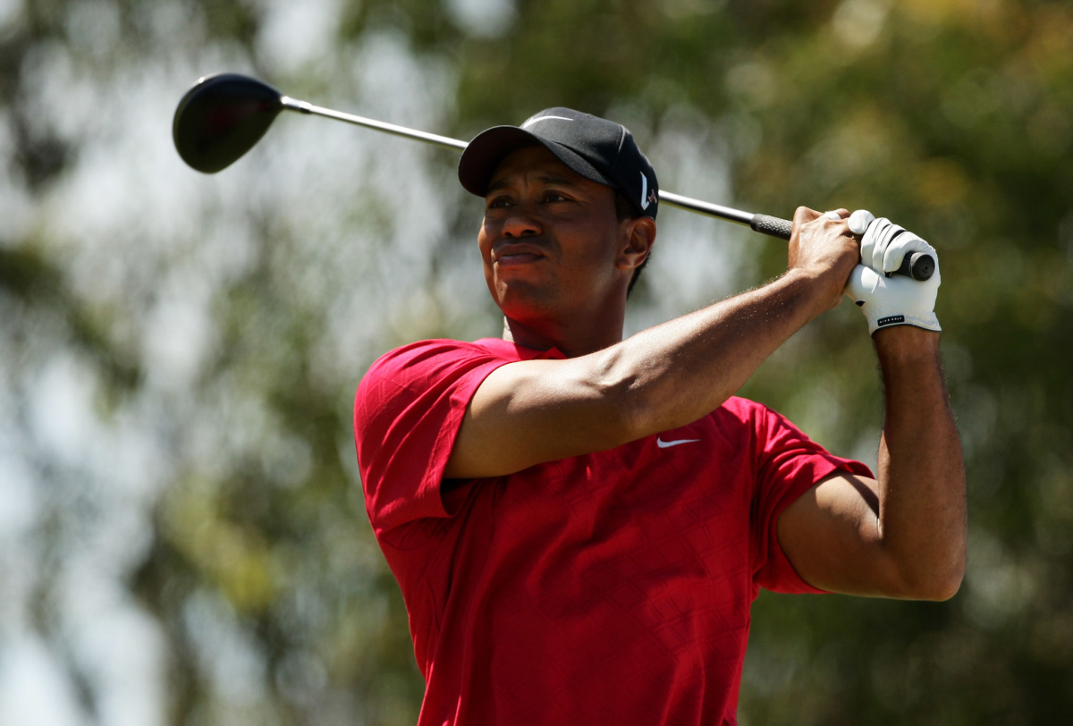 Tiger Woods tees off at the Australian Masters in November 2009.