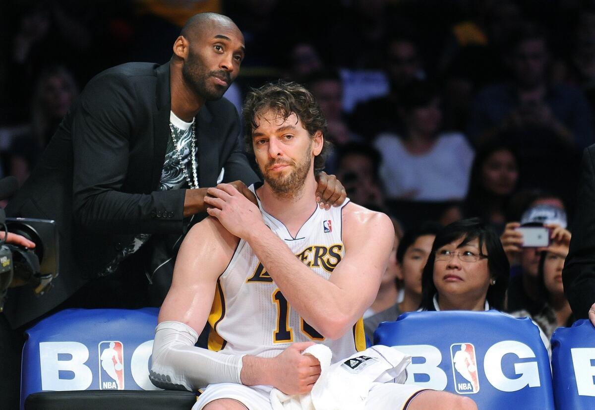 Kobe Bryant consoles Pau Gasol during a playoff loss against San Antonio last spring.