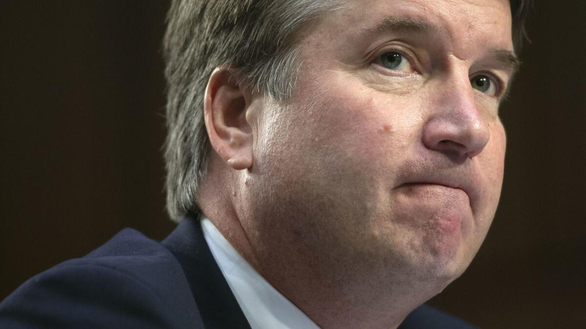 Judge Brett Kavanaugh testifies during the second day of his Senate Judiciary Committee confirmation hearing. His accuser says she will not testify before senators until the FBI has investigated her claim.