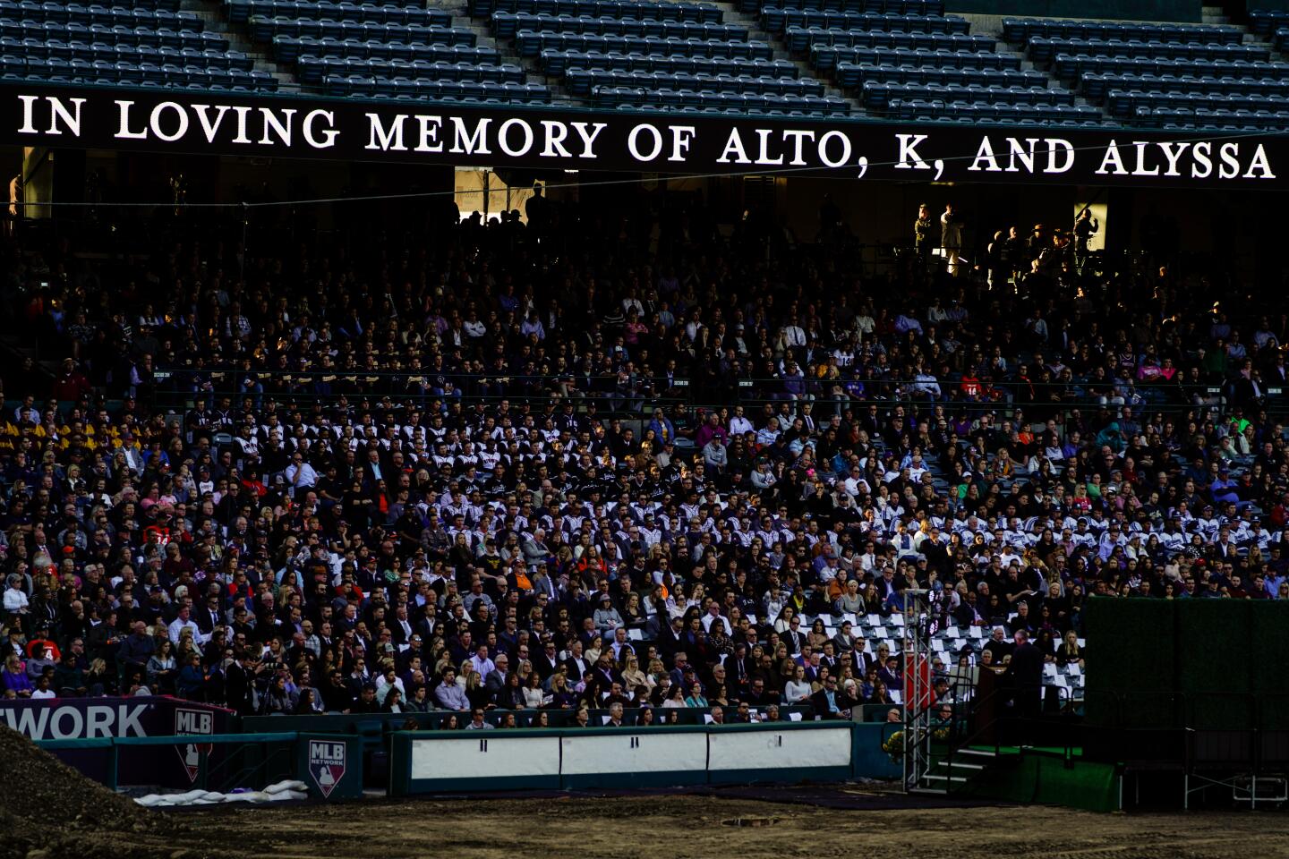 People in the seats during a celebration of life ceremony at Angel Stadium on Monday to honor the lives of John, Keri and Alyssa Altobelli.