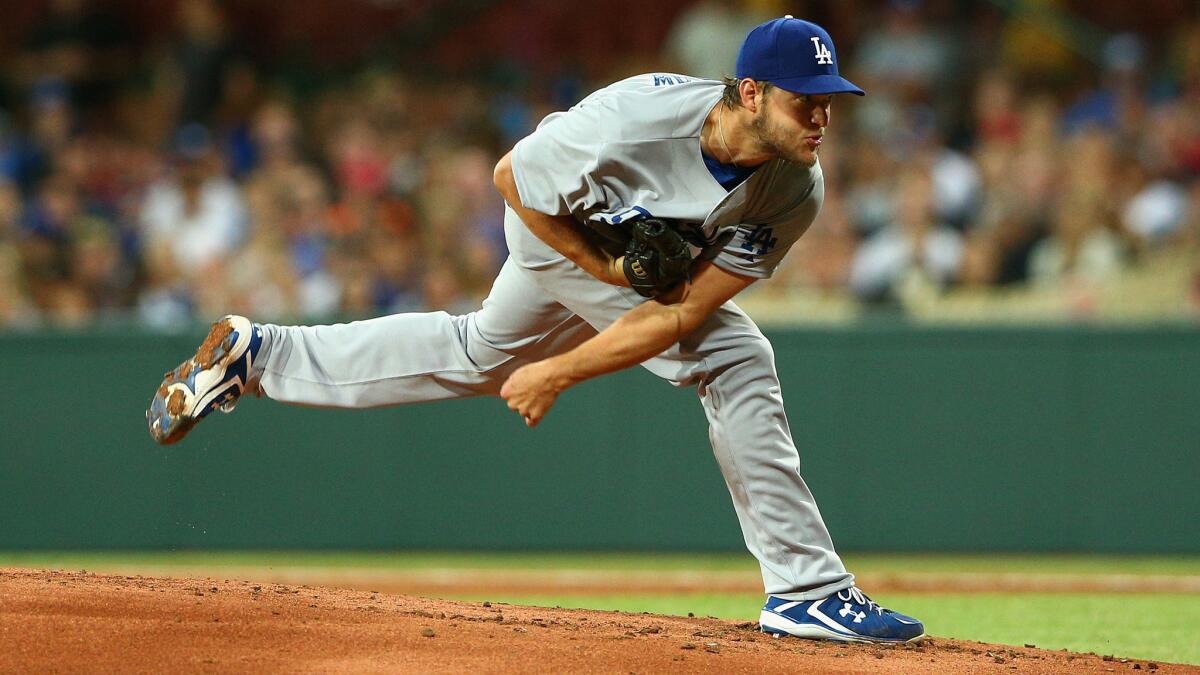 Dodgers starter Clayton Kershaw delivers a pitch during the team's season-opening win over the Arizona Diamondbacks in Australia last month.