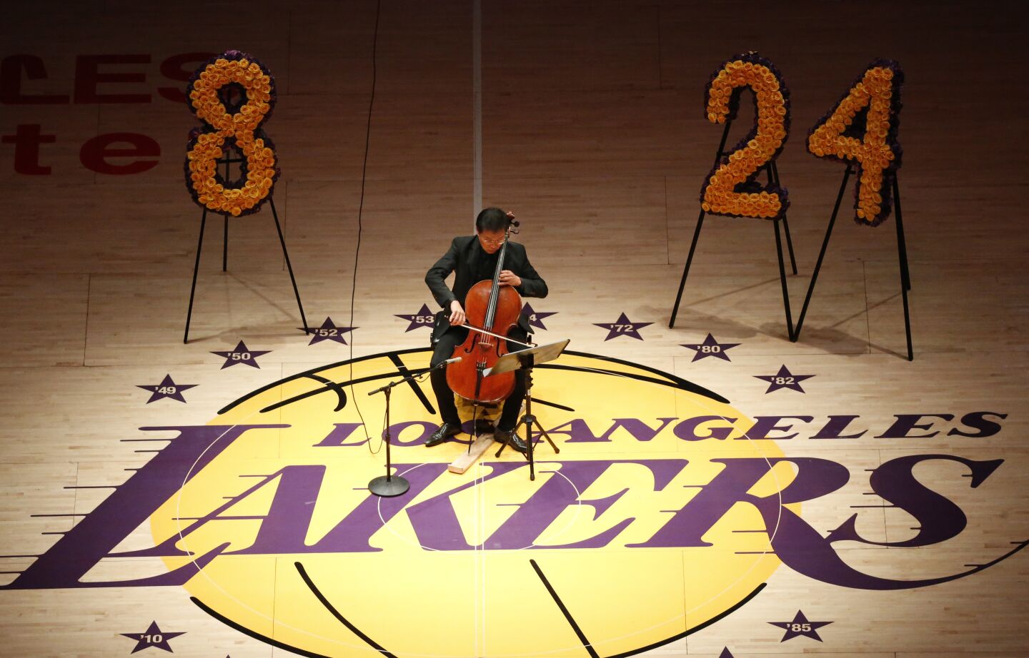 Cellist Ben Hong performs a tribute to Kobe Bryant, daughter Gianna and seven others who died in a helicopter crash.