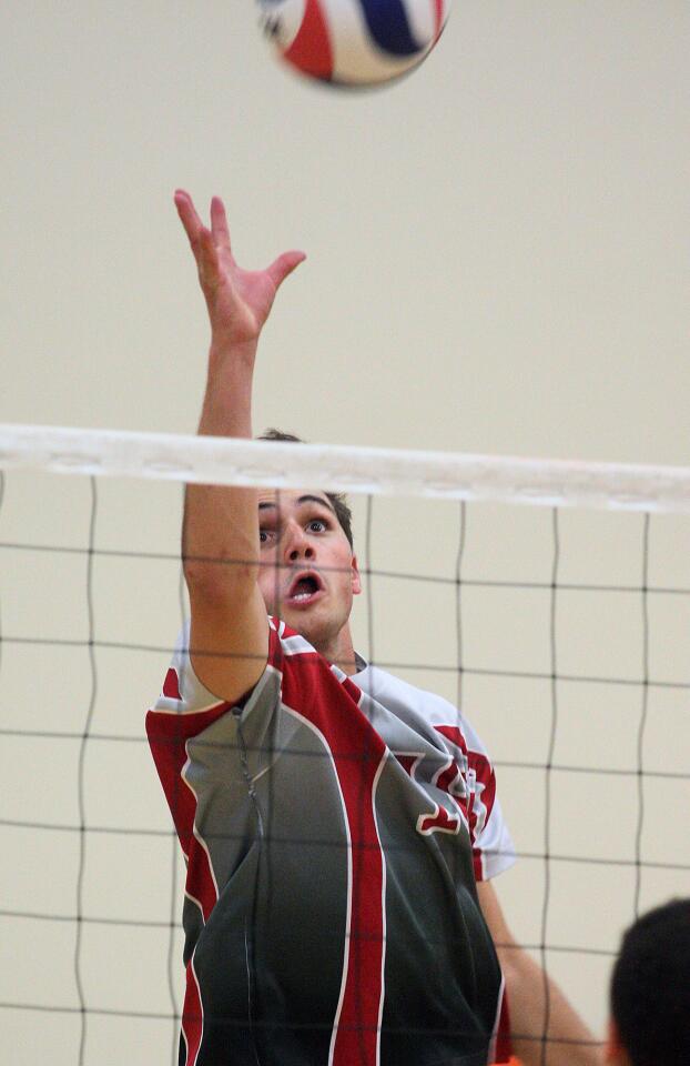 Burroughs' Nick Van Loo reaches for the kill attempt in the seniors match of the San Gabriel Valley 2014 All-Star Game pitting area private schools against area public schools on Saturday, June 7, 2014 at Pasadena Polytechnic School in Pasadena. (Tim Berger/Staff Photographer)